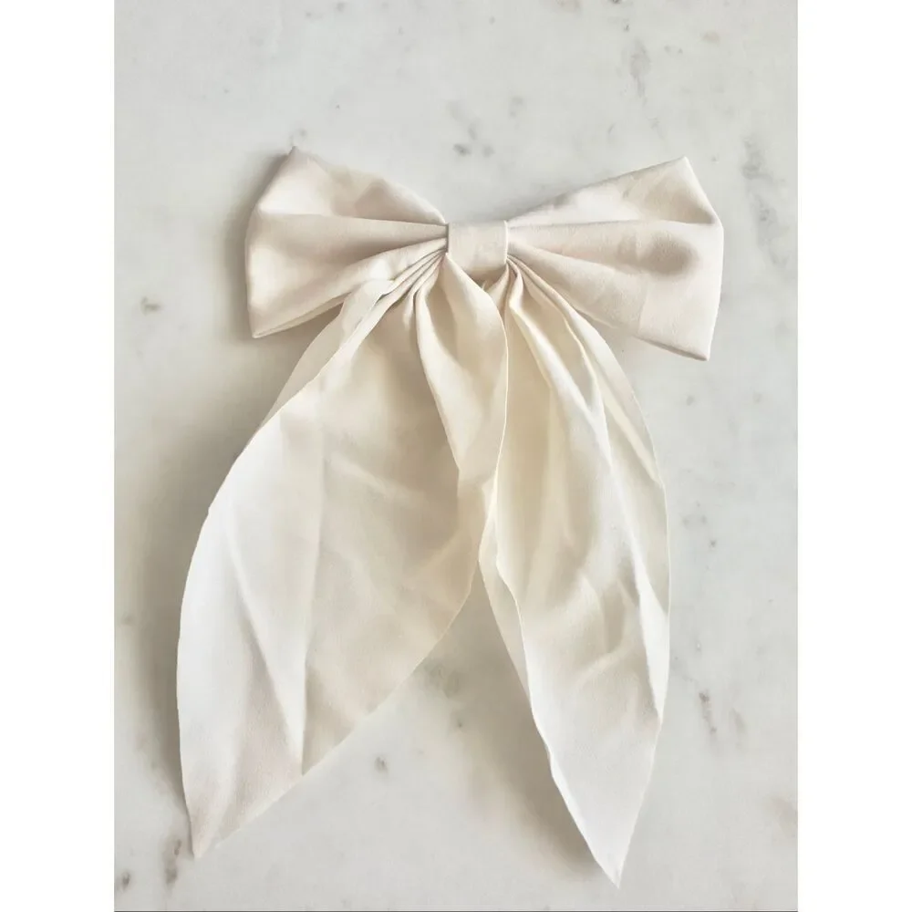 Cream color clip hair bow